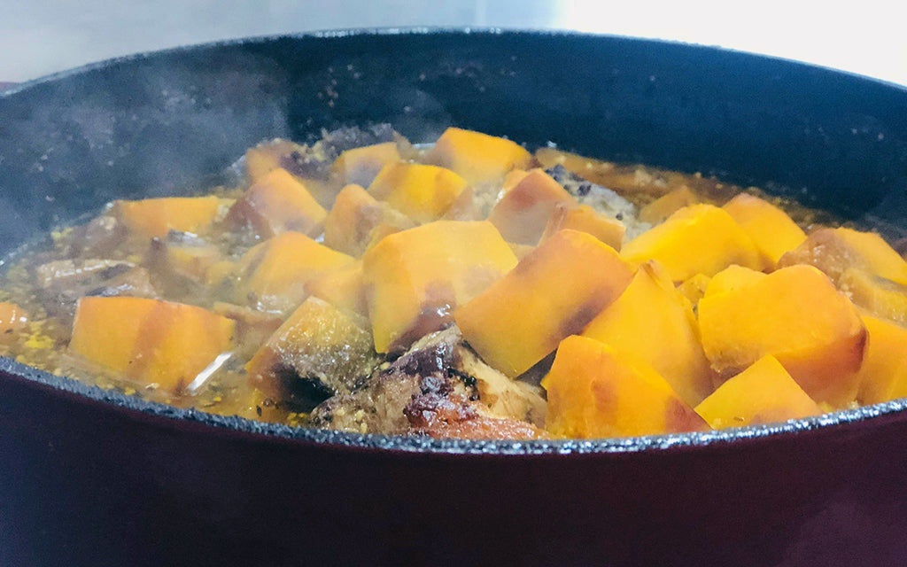 Braisé de porc à la moutarde, courge et tomates jaunes